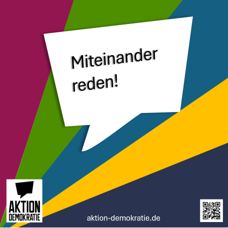 Sprechblase mit dem Text "Miteinander reden!" und bunten diagonalen Farben.